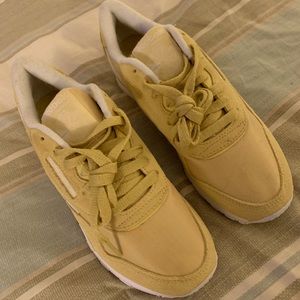 Yellow Rebook gym shoes size 7.5.